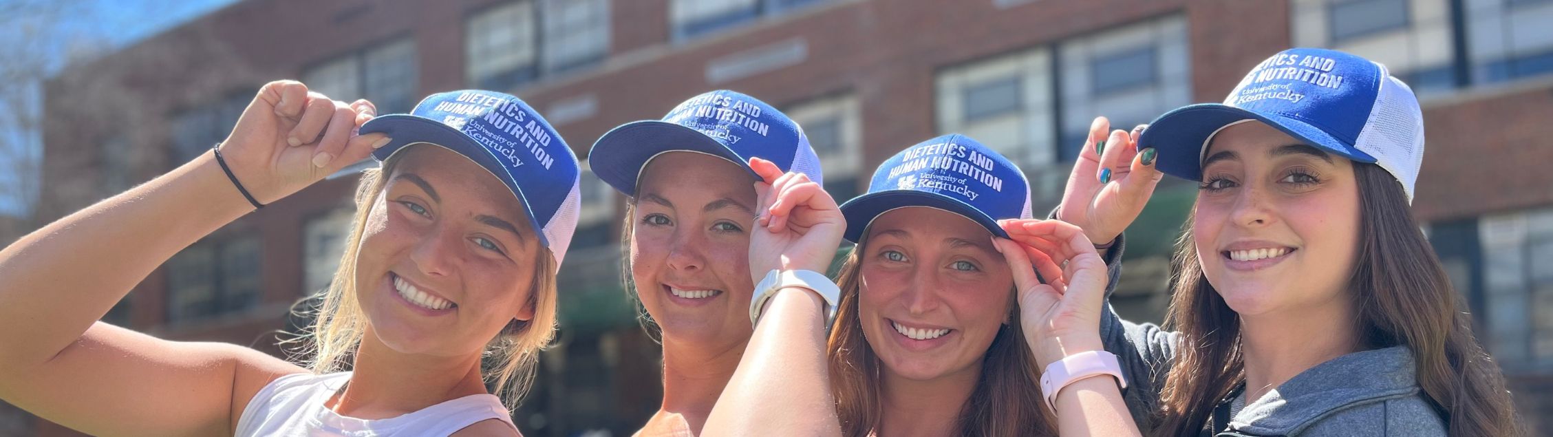 Students wearing DHN hats