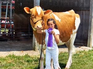 Young Emily with cow